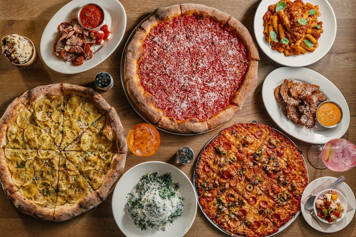 a tray of loaves of pizza dough